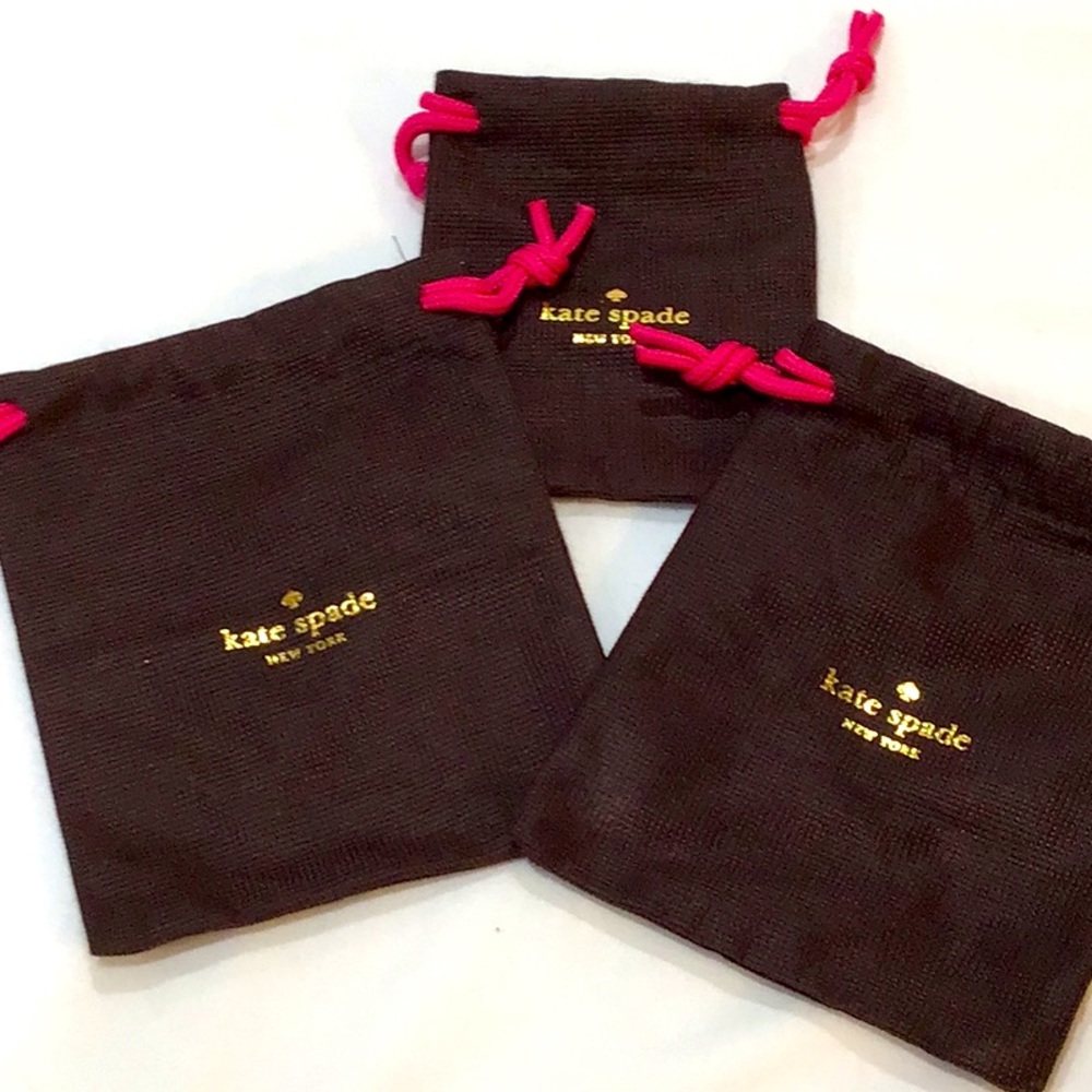 Three small Kate spade gift bags
